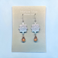 Harlow Mae Designs LLC ornate silver-toned mandala drop earrings with amber teardrop gemstone accent.