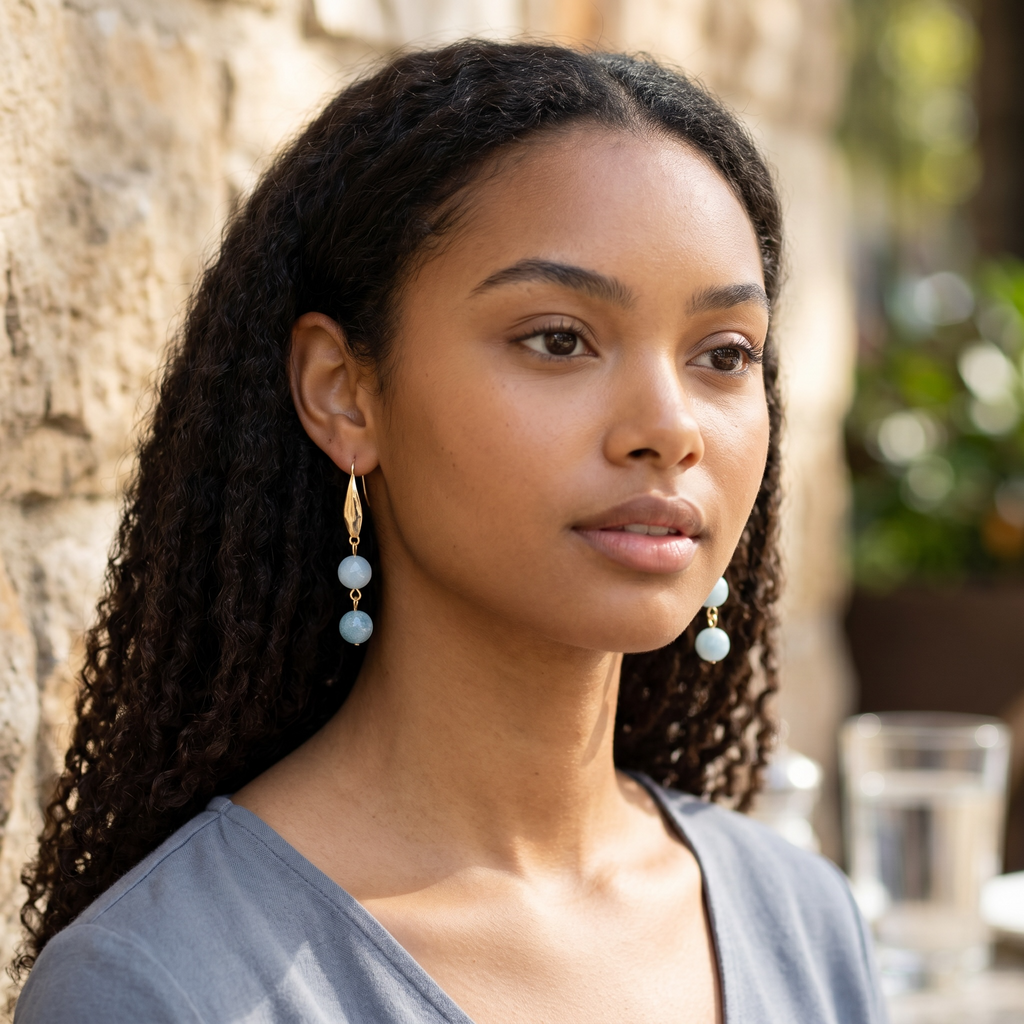 Harlow Mae double stone drop earrings with sky-blue beads and gold-tone metal accent.
