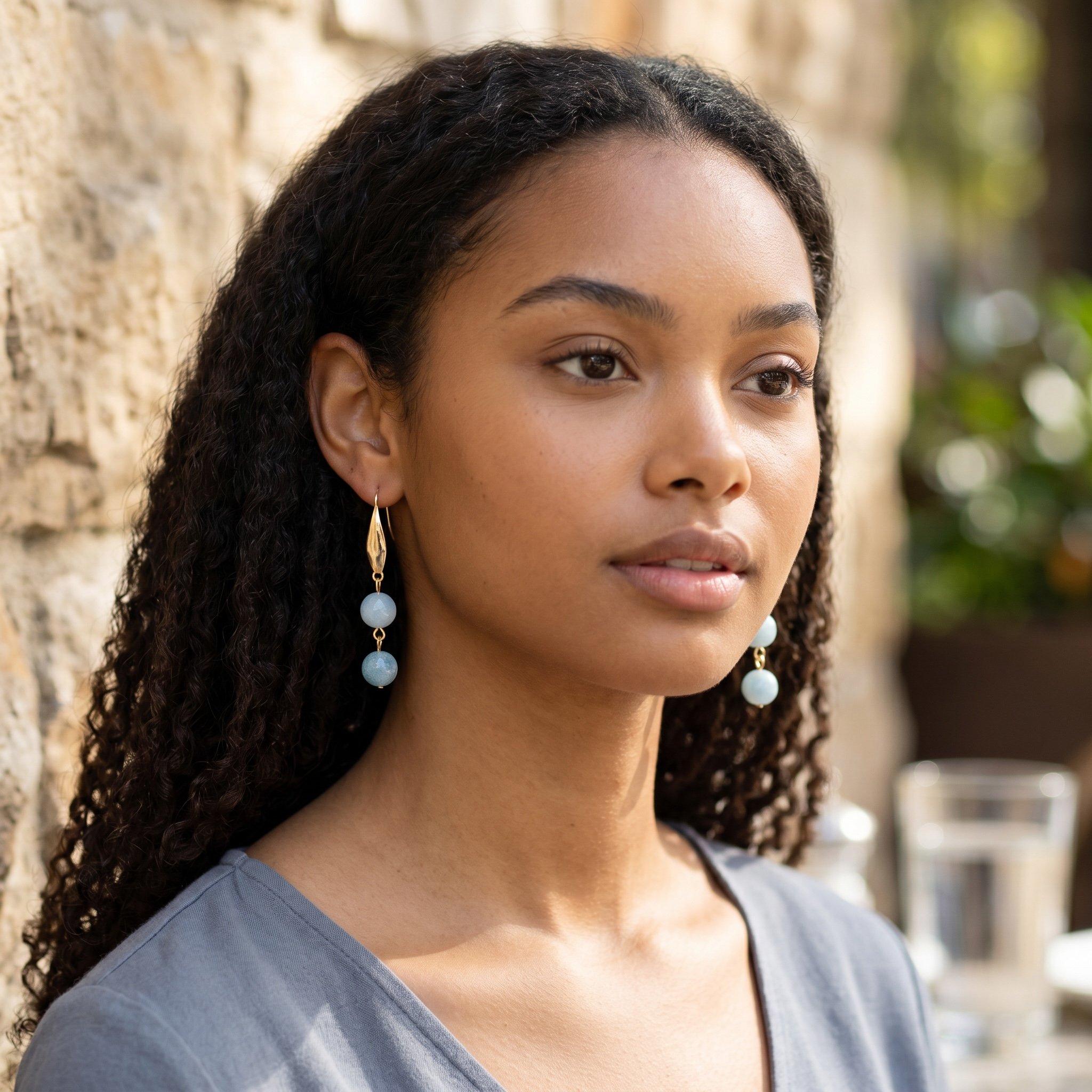 Harlow Mae double stone drop earrings with sky-blue beads and gold-tone metal accent.