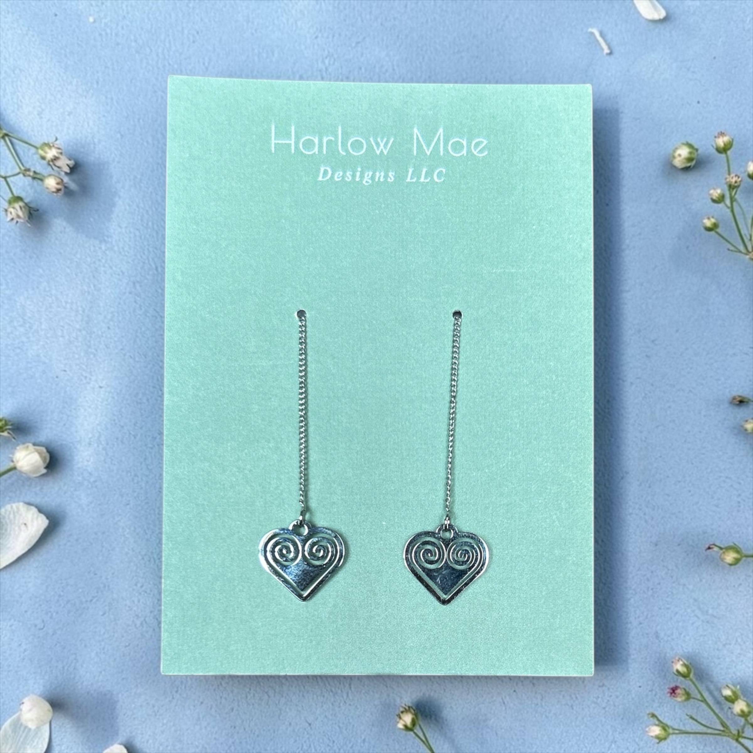 Harlow Mae silver-toned metal heart drop threader earrings with spiral design. Lightweight and elegant.