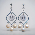 Harlow Mae ornate silver-tone chandelier earrings with faux pearls and intricate filigree detailing.
